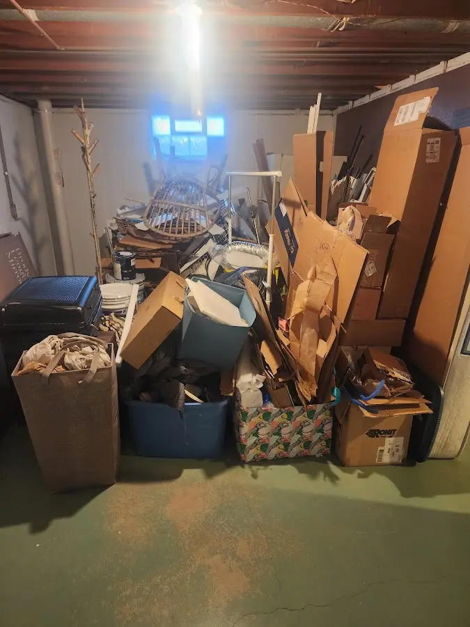 Roll-off dumpster container at job site for Cleanout Dumpster Rental in Falmouth